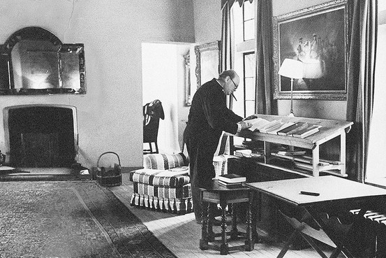 churchill upright Vintage man working at an upright desk illustration.