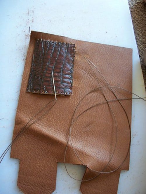 Sewing the card pocket for leather wallet. 