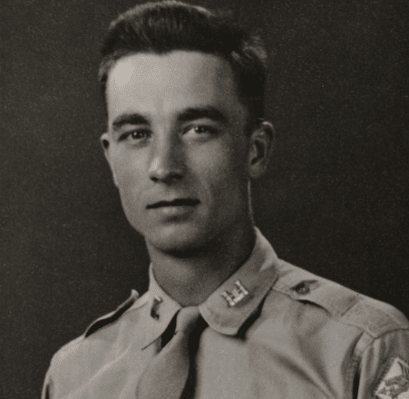 A black and white photo of a man in uniform exudes wisdom.